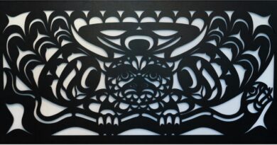 Iron metalwork of Komox Indigenous design of owl and smoke.