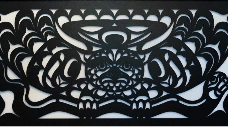 Iron metalwork of Komox Indigenous design of owl and smoke.