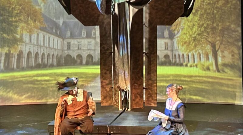 Two actors playing Roxanne and Cyrano on stage