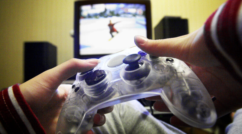 hands holding a video game controller