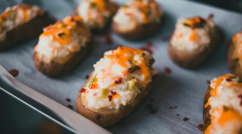 baked potatoes on an oven pan