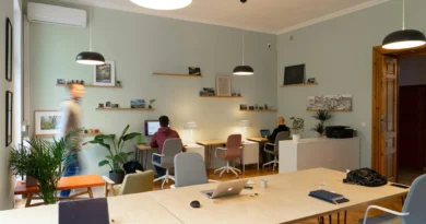 Open office room with two people working at desks