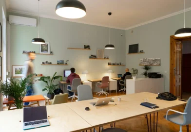 Open office room with two people working at desks